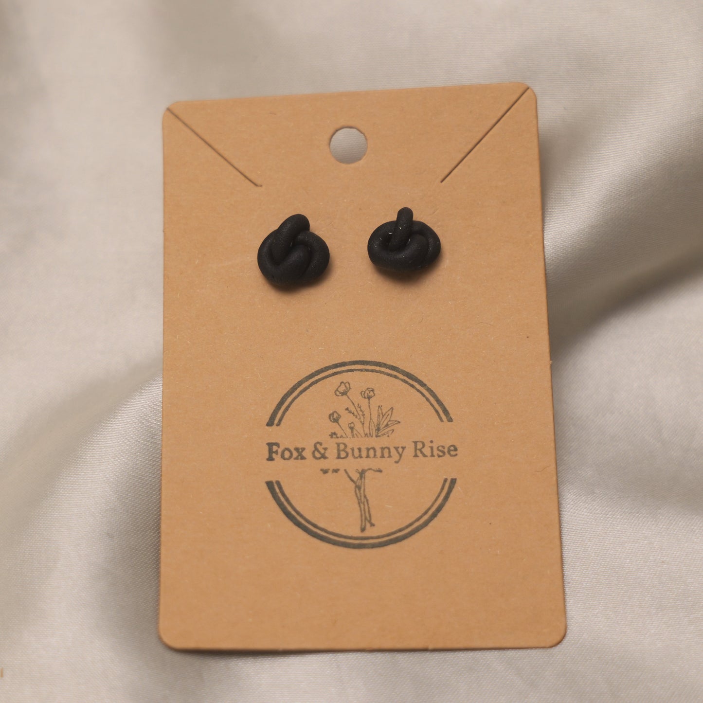 Black Shimmery Knot Studs Earrings