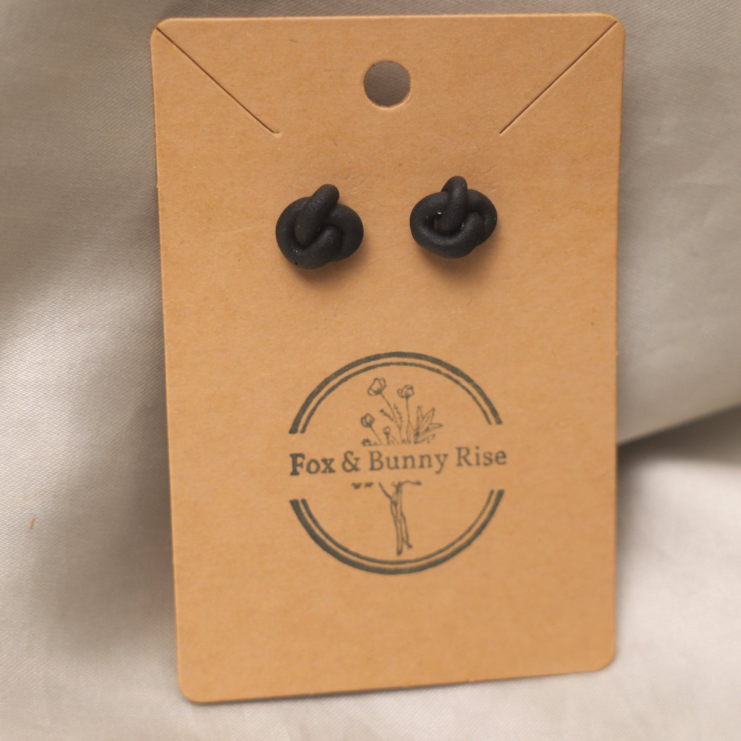 Black Shimmery Knot Studs Earrings