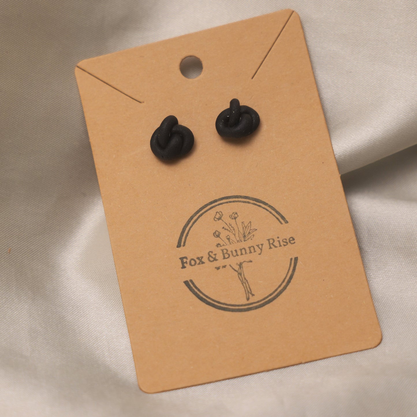 Black Shimmery Knot Studs Earrings