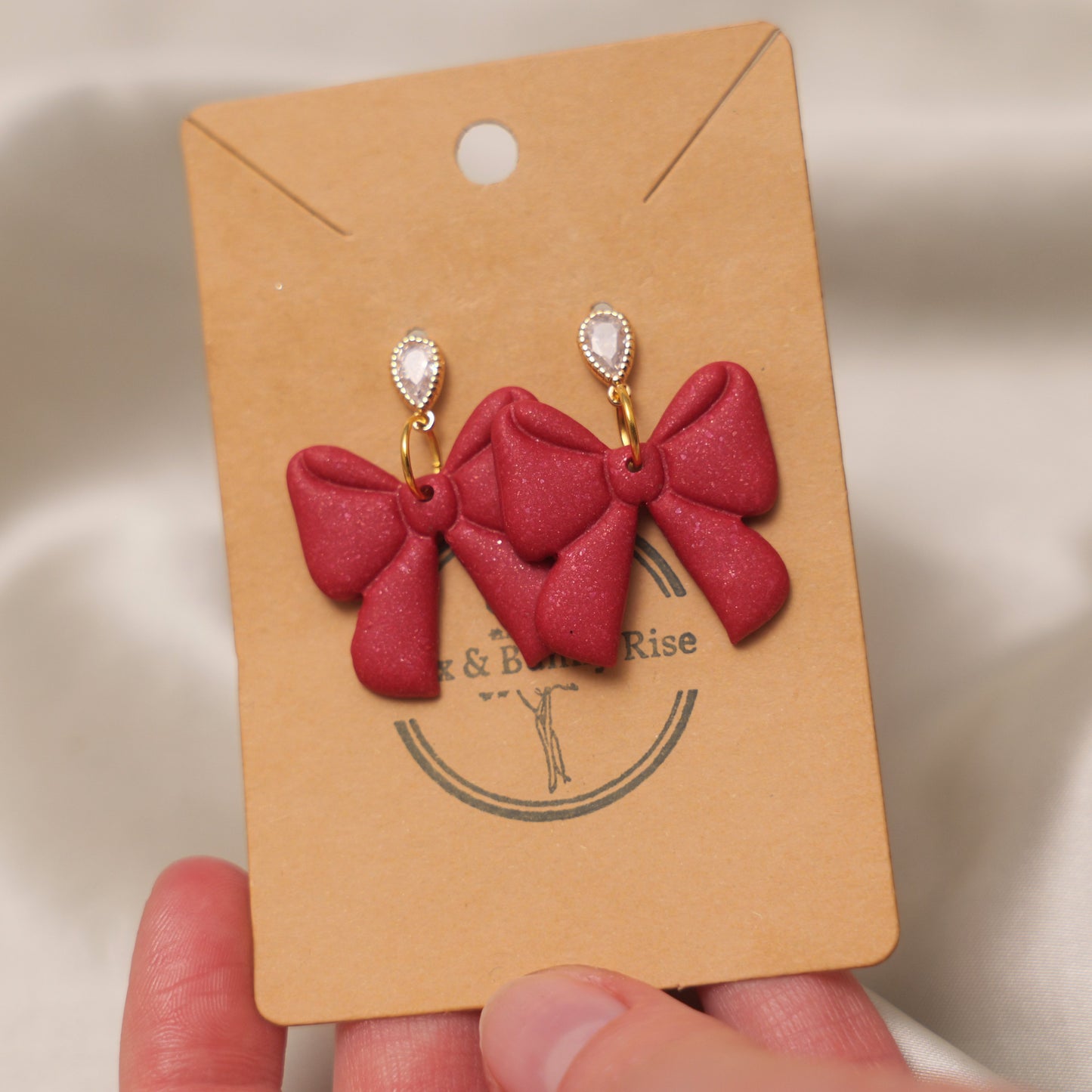 Red Shimmery Bow Dangle Earrings