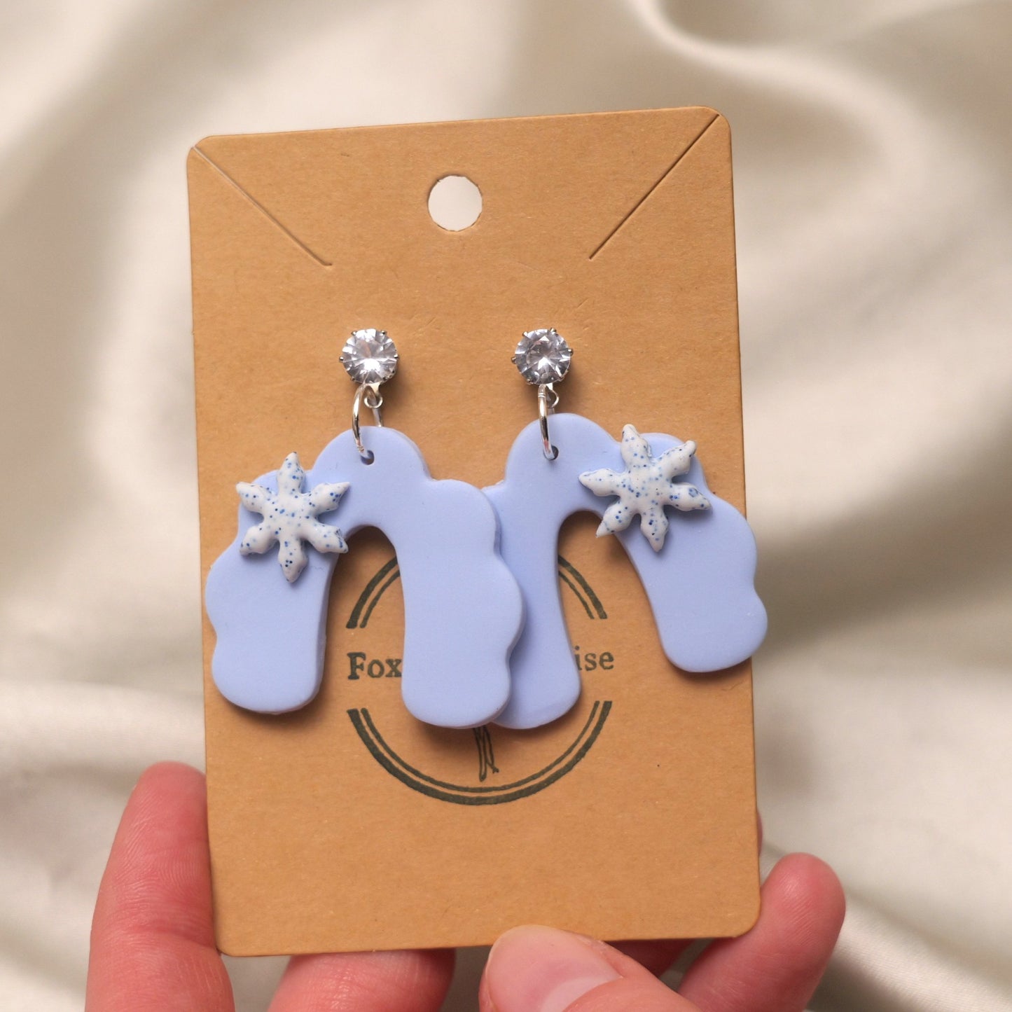 Baby Blue Dangles with Glittery Snowflakes and Cubic Zirconia - Rainbow