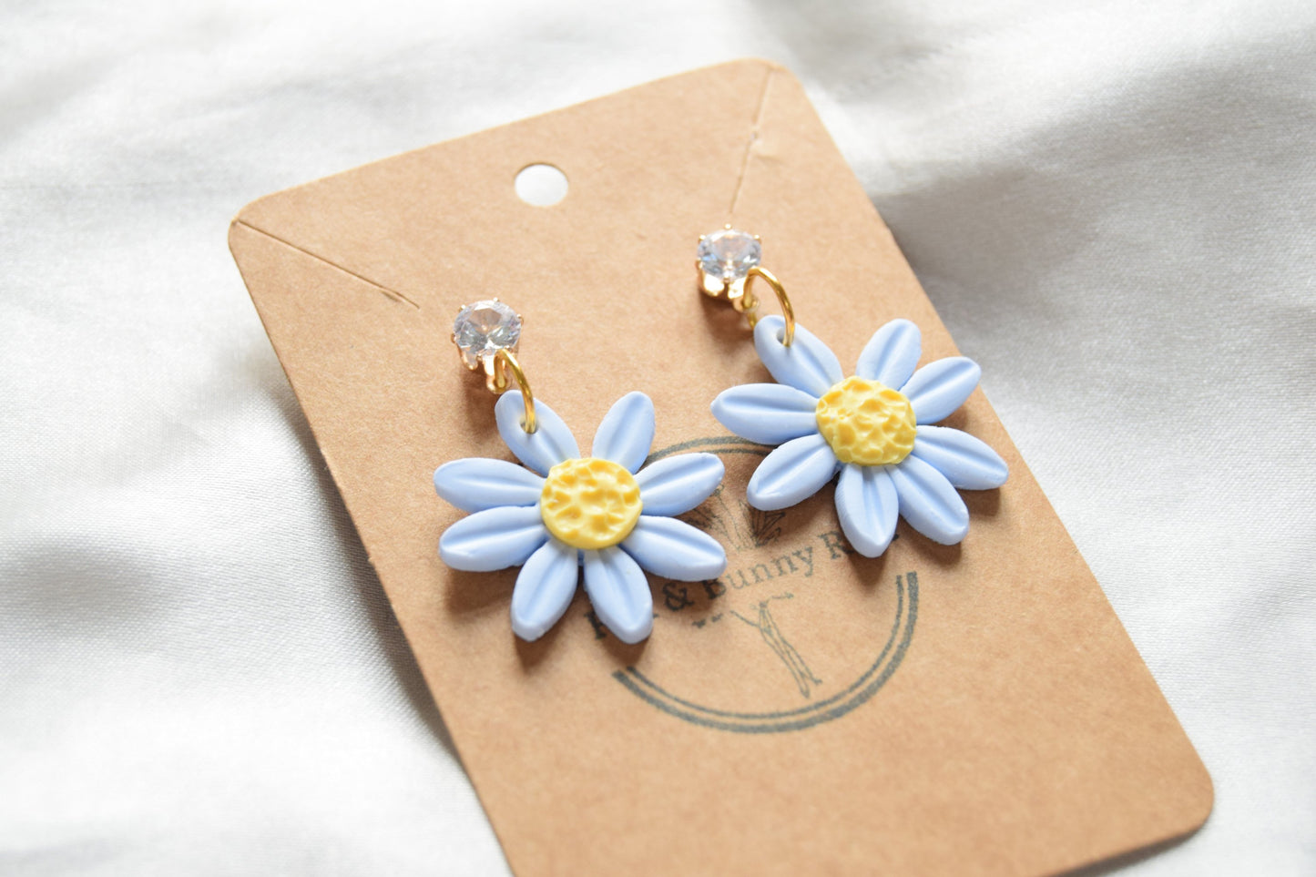Polymer Clay Pastel Blue Daisy Dangles with Cubic Zirconia