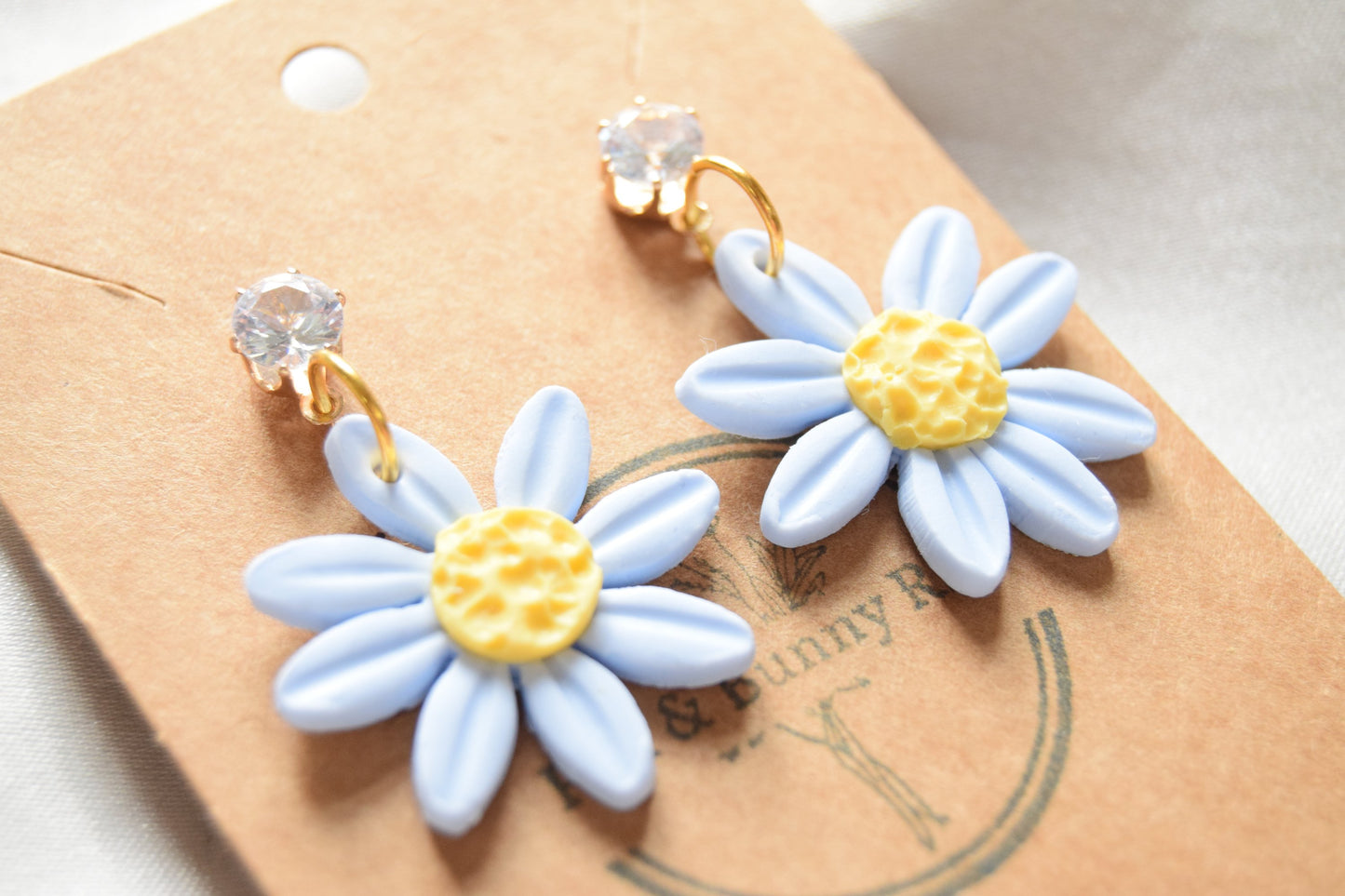 Polymer Clay Pastel Blue Daisy Dangles with Cubic Zirconia